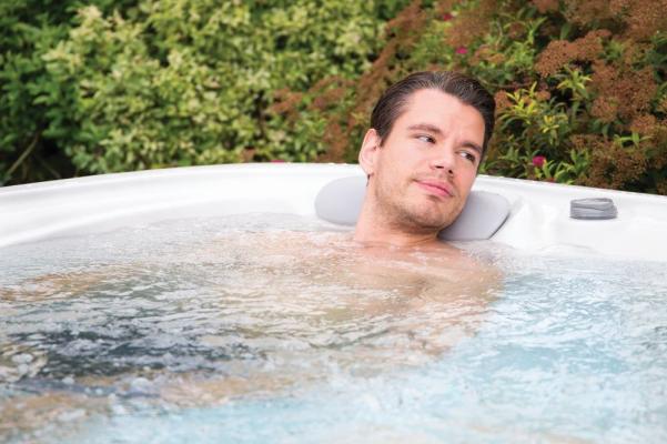 man in a hot tub